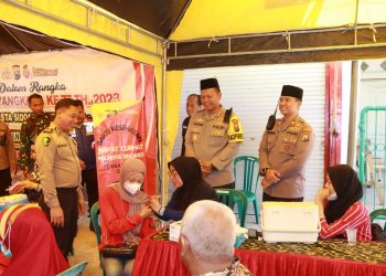 Polresta Sidoarjo Gelar Bakti Kesehatan dan Baksos di Desa Banjar Bendo