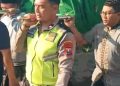 Bhabinkamtibmas Polsek Krian Takziah dan Antar Jenazah Warga