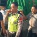Bhabinkamtibmas Polsek Krian Takziah dan Antar Jenazah Warga